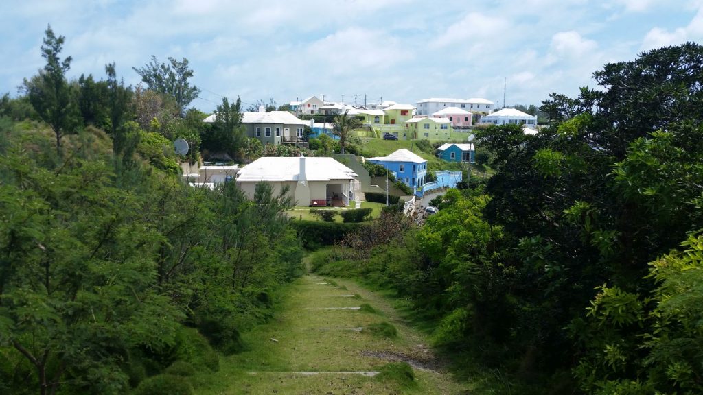 Hiking on the Bermuda Railway Trail near a residential area